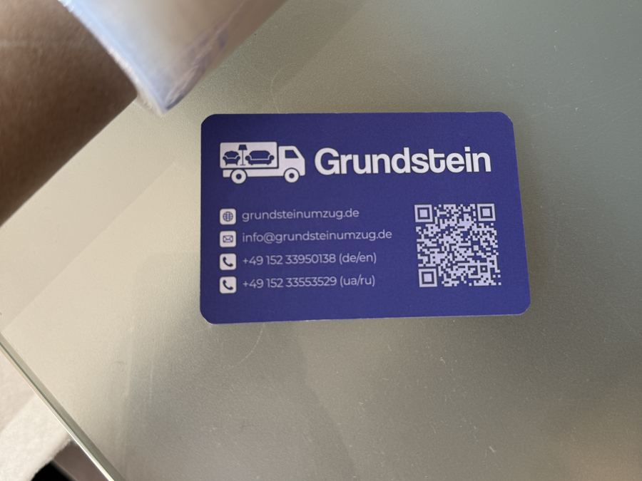 Visitenkarte von Grundstein – Umzuege & Transporte mit Telefonnummer und E-Mail-Adresse